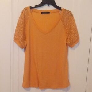 women xl coral orange top , crochet design sleeves